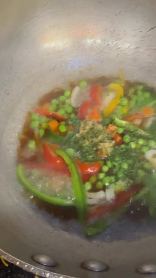 Foundation Lounge chef sauteing fresh garden vegetables foundation restaurant nyc - Contemporary Fusion Brooklyn